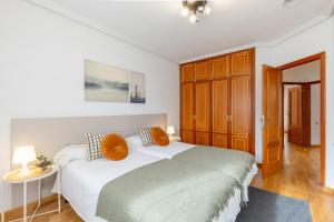 A bed or beds in a room at Fidalsa Paradise Pines
