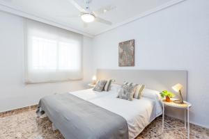 A bed or beds in a room at Fidalsa Paradise Pines