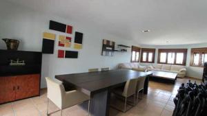 Гостиная зона в Casa Jardin del Valle TuCasaTemporal