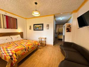 Postel nebo postele na pokoji v ubytování Tambo Lodge Canta + 30 fotografií