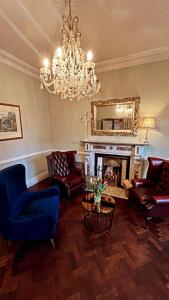 Część wypoczynkowa w obiekcie Maples House Hotel