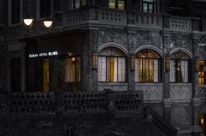 Fotografie z fotogalerie ubytování 重庆复古阁楼酒店 v destinaci Čchung-čching