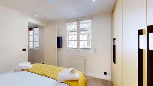 Posteľ alebo postele v izbe v ubytovaní 170 Suite Z - Superbe Appartement à Paris