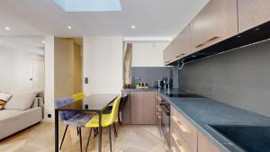 Kuchyňa alebo kuchynka v ubytovaní 170 Suite Z - Superbe Appartement à Paris