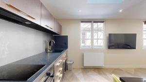 Kuchyňa alebo kuchynka v ubytovaní 170 Suite Z - Superbe Appartement à Paris