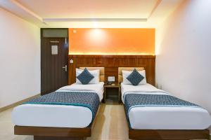 Postel nebo postele na pokoji v ubytování Hotel Shri Vinayak in City Centre at New Delhi Railway Station-By RCG Hotels + 37 fotografií