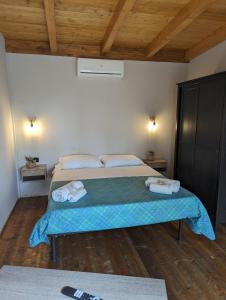 Postel nebo postele na pokoji v ubytování Cubo House