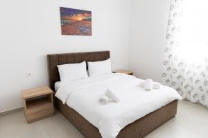 Postel nebo postele na pokoji v ubytování Hotel Paradise