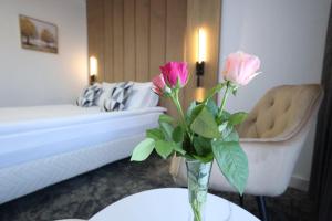 Postel nebo postele na pokoji v ubytování Hotel Soimul