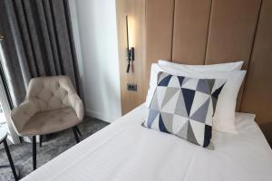 Postel nebo postele na pokoji v ubytování Hotel Soimul