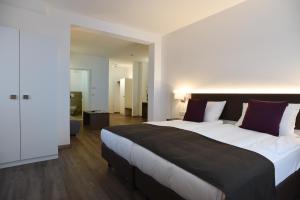 Postel nebo postele na pokoji v ubytování Guesthouse Lichtenau