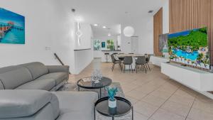 a living room with a couch and a table at 812 Mariners Club in Key Largo