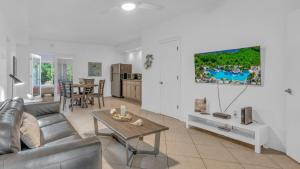 a living room with a couch and a table at 812 Mariners Club in Key Largo