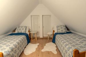 Ένα ή περισσότερα κρεβάτια σε δωμάτιο στο Bukowe Zacisze