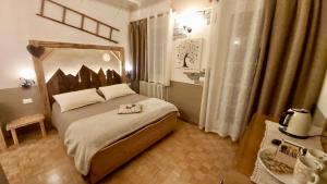 Postel nebo postele na pokoji v ubytování B&b Villa Paradiso