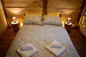 Cama o camas de una habitación en Royal Village Kotromanićevo