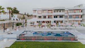 an aerial view of a hotel with a swimming pool at The Palms Concept Hotel Adults Only 16 Plus in Faliraki