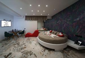 TV a/nebo společenská místnost v ubytování Hotel Manuela
