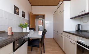 Dapur atau dapur kecil di Ostseebad-Karlshagen-geraeumige-Ferienwohnung-Herbst +18 gambar