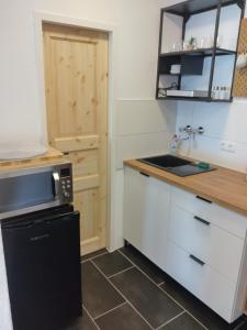 Η κουζίνα ή μικρή κουζίνα στο Appartement Valentino +10 φωτογραφίες