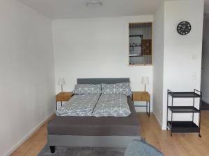 Ένα ή περισσότερα κρεβάτια σε δωμάτιο στο Appartement Valentino