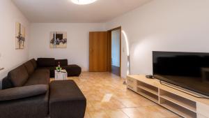 TV/Unterhaltungsangebot in der Unterkunft Bernsteinbad Koserow - Haus Fünf Elemente Ferienwohnung Feuer
