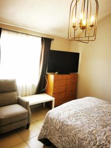 Μια τηλεόραση ή/και κέντρο ψυχαγωγίας στο Casa san luis Potosi