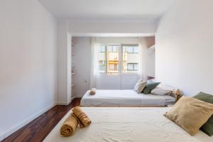 A bed or beds in a room at Apartamento del Mar