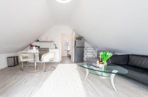 Kuchyň nebo kuchyňský kout v ubytování Ostseebad-Zinnowitz-Kuschelige-Ferienwohnung-Wolken