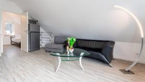 Kuchyň nebo kuchyňský kout v ubytování Ostseebad-Zinnowitz-Kuschelige-Ferienwohnung-Wolken + 10 fotografií