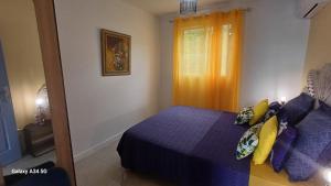 Postel nebo postele na pokoji v ubytování GÎTES CAPRA POMME SURETTE-SPA pomme surette SPA