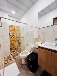 Koupelna v ubytování Hotel Glorial