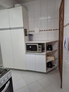 Dapur atau dapur kecil di Apartamento em Armação espaçoso e com localização excelente!