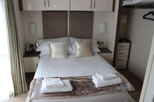 Ένα ή περισσότερα κρεβάτια σε δωμάτιο στο Mulberry Lodge, Felton, Morpeth