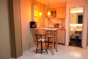 Kuchyň nebo kuchyňský kout v ubytování Provenza Medellin Hotel Boutique