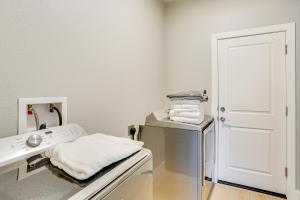 a laundry room with a sink and a washing machine at 5 Mi to Shasta Lake Newly Built Home with Backyard! in Shasta Lake +22 photos