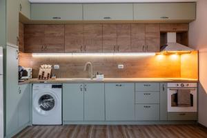 Η κουζίνα ή μικρή κουζίνα στο Artemida Apartment