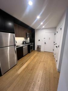 Kuchyň nebo kuchyňský kout v ubytování Beautiful 1 Bedroom Condo