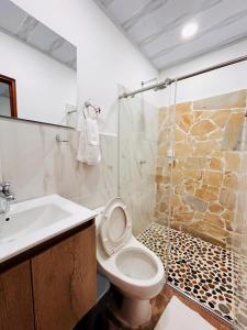 Koupelna v ubytování Hotel Glorial