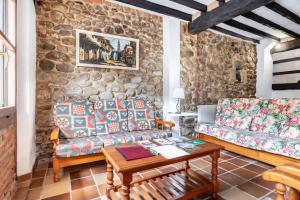 Posezení v ubytování La Jomeruca ,espaciosa casa rural cerca de playa y montaña
