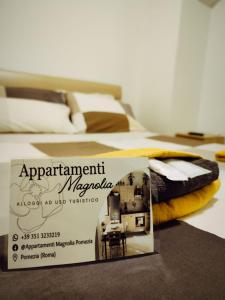 Postel nebo postele na pokoji v ubytování Appartamento Magnolia 2