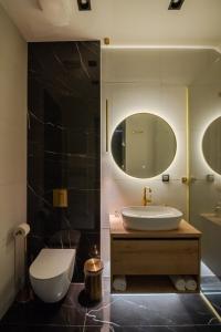 Koupelna v ubytování UpArt Home & Spa