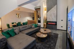 Posezení v ubytování UpArt Home & Spa
