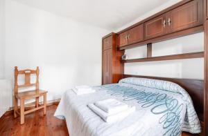 Postel nebo postele na pokoji v ubytování La Jomeruca ,espaciosa casa rural cerca de playa y montaña