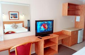 TV a/nebo společenská místnost v ubytování Glen Inn