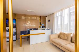 a store lobby with a counter and a couch at 3 BR luxury apartment, Kigali-Nyarutarama in Kigali