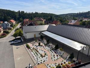 an overhead view of a building with a garden at Golden Hotel in Vyšší Brod