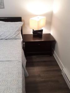 Postel nebo postele na pokoji v ubytování Logement neuf, spacieux