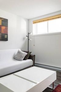 Postel nebo postele na pokoji v ubytování Logement neuf, spacieux