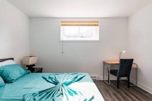 Postel nebo postele na pokoji v ubytování Logement neuf, spacieux